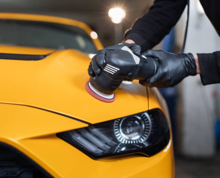 Technician applying ceramic coating