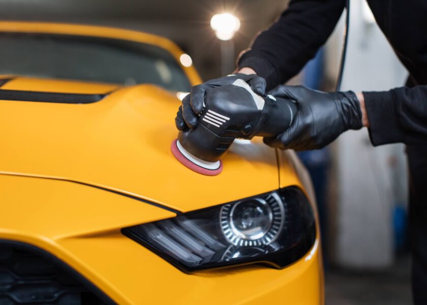 Technician applying ceramic coating