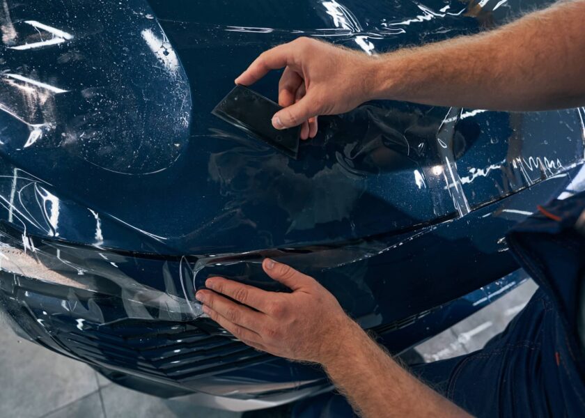 Automotice design and protection specialist applying PPF to Vehicle in Baltimore, MD
